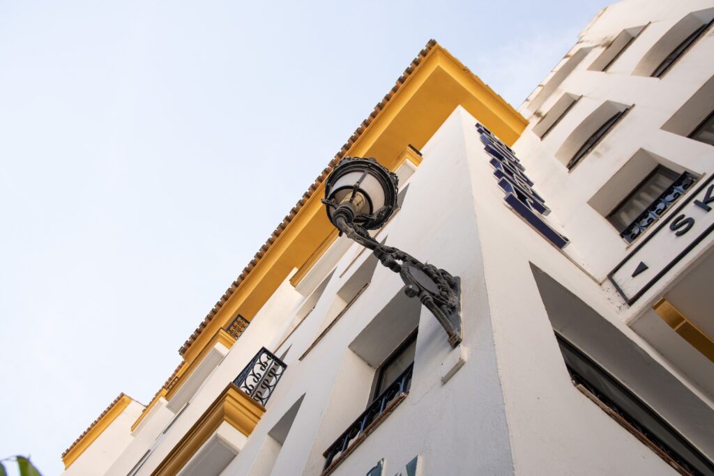 Image looking up at an apartment for sale, part of the Marbella property market in 2024