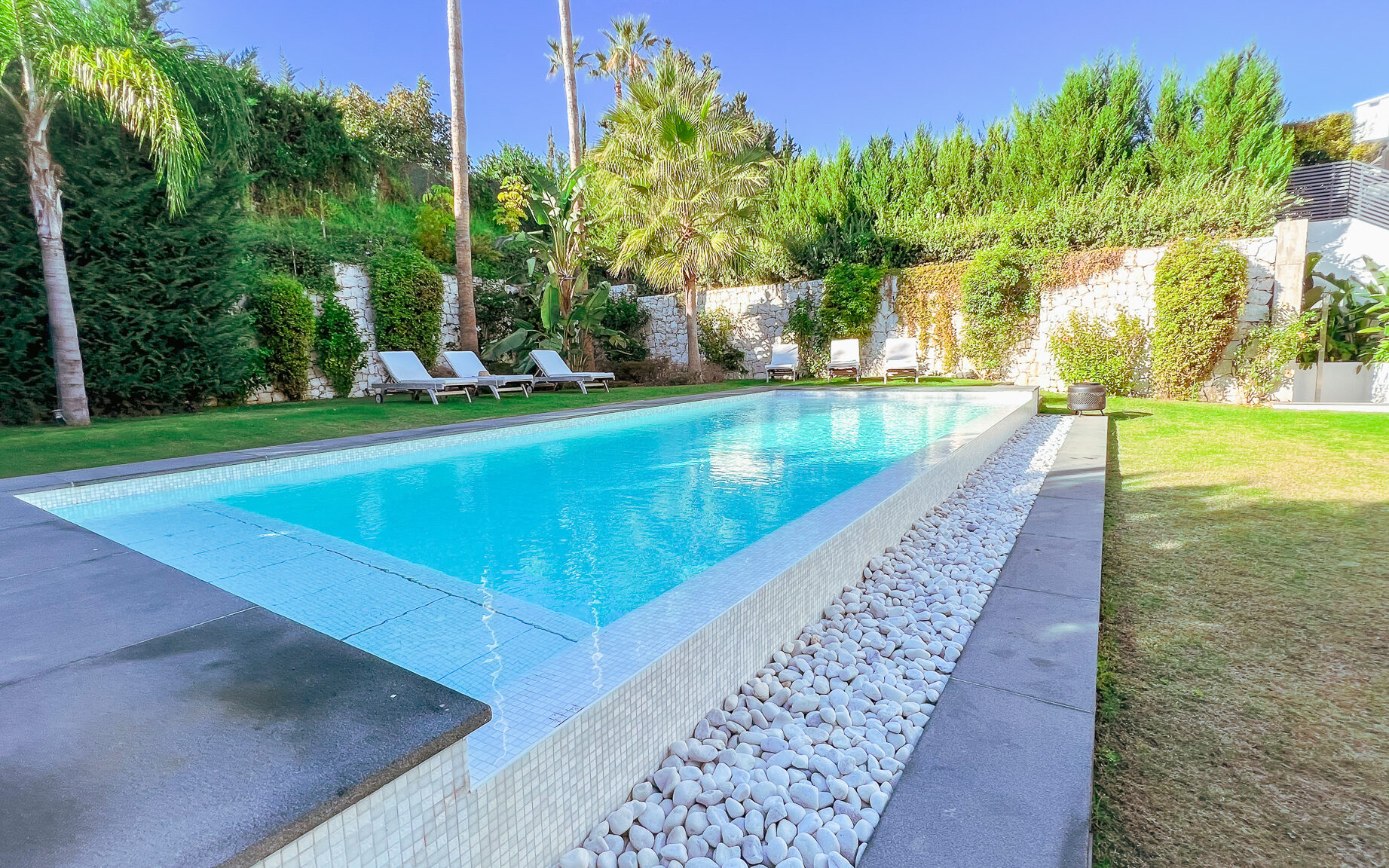 Image of a pool at a luxury villa for sale, part of the Marbella property market in 2024