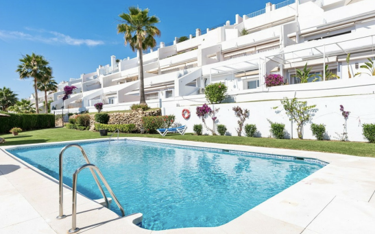 Image looking at an apartment block for sale, part of the Marbella property market in 2024